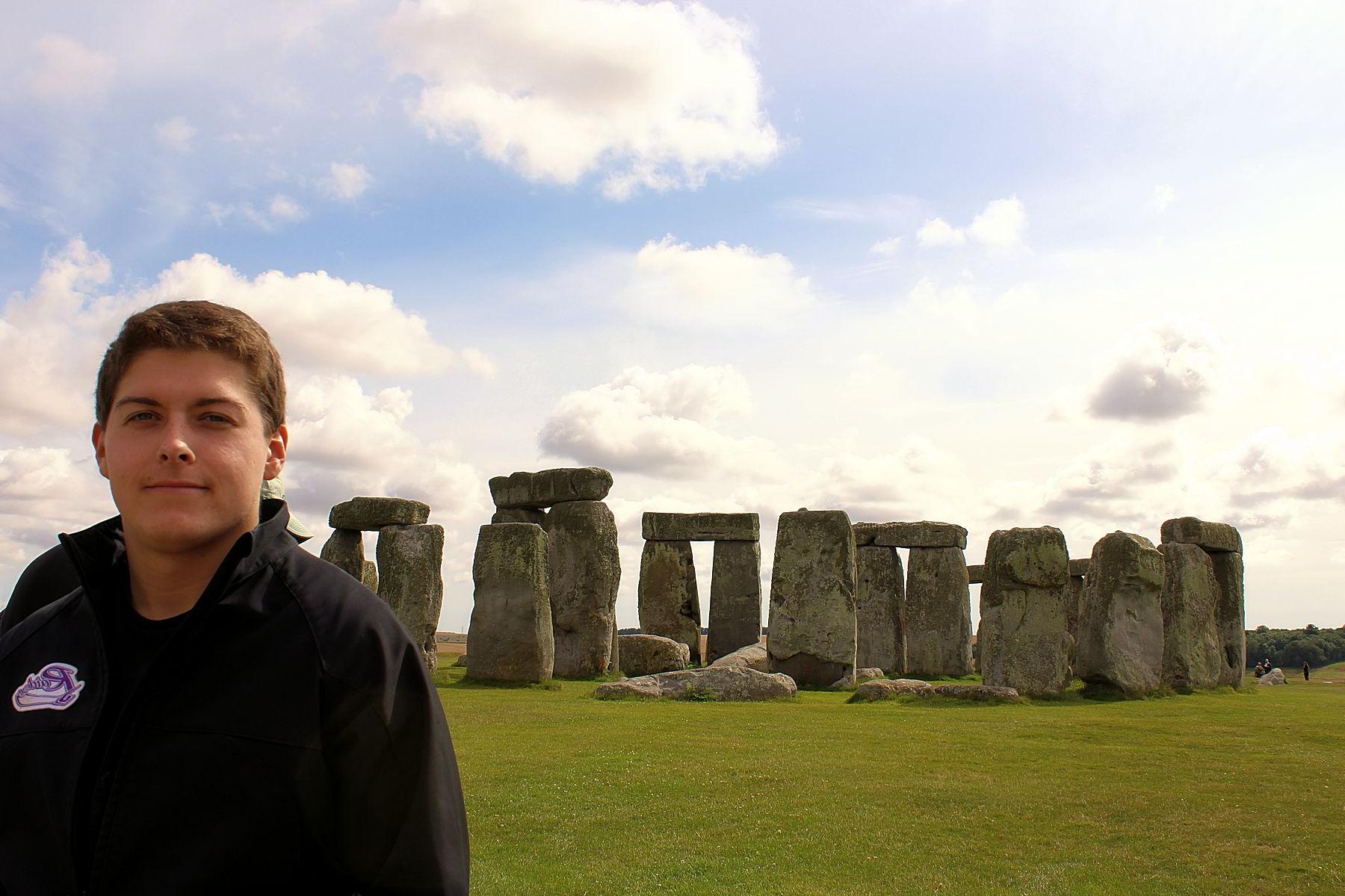 Male student in front of Stonehenge